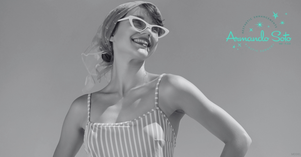 Woman in a bathing suit smiling (MODEL) Aesthetic Enhancements Plastic Surgery & Laser Center: Armando Soto, MD Logo